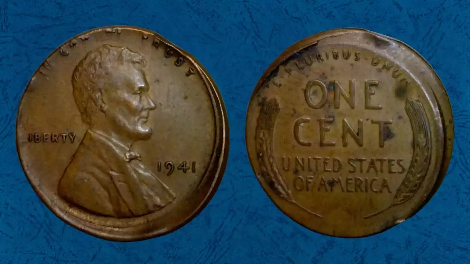 1941 wheat penny off-center strike error showing partial design and missing edge detail